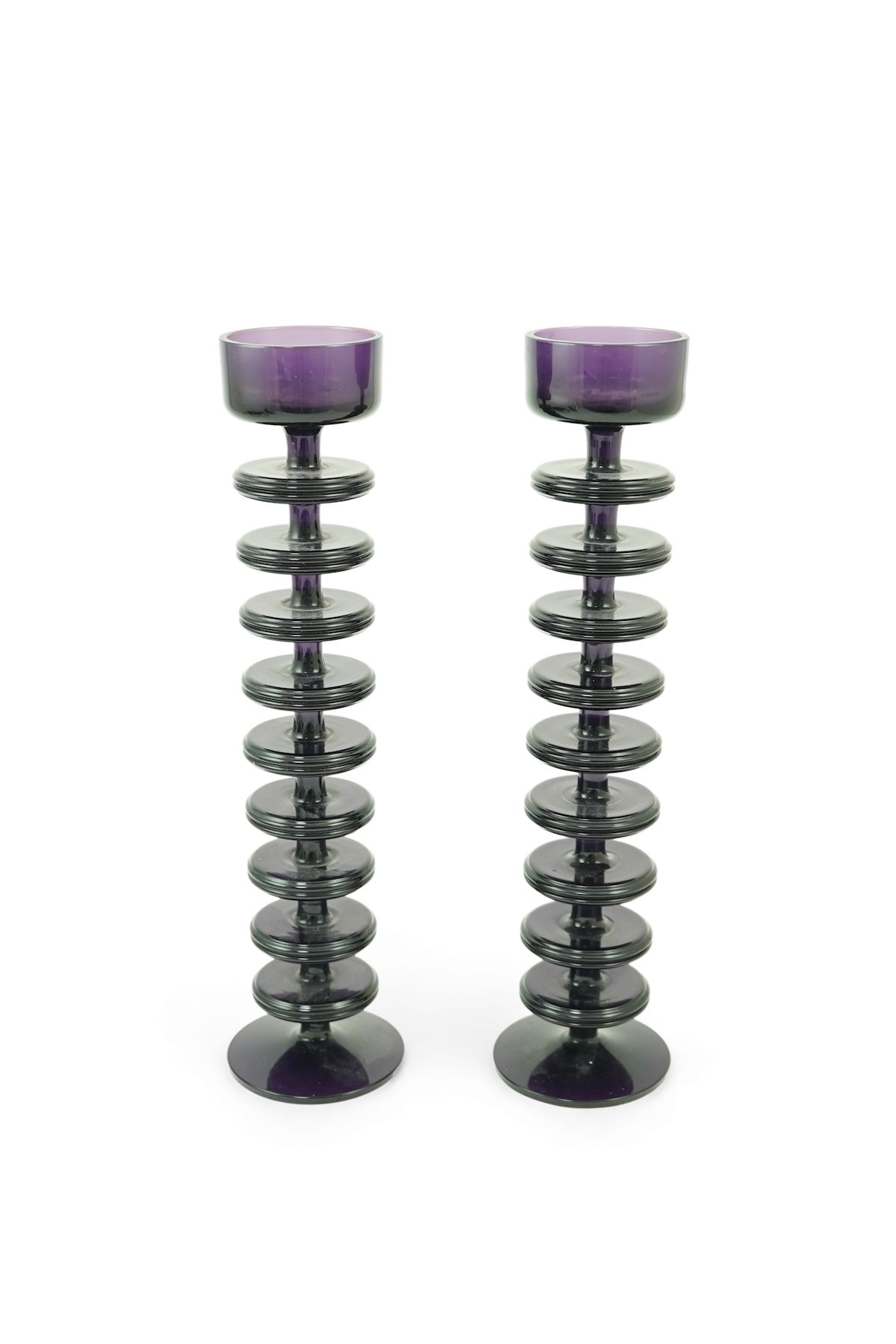 Ronald Stennett-Wilson (1915-2009) for Wedgwood: A pair of nine-ring 'Sheringham' amethyst glass candlesticks